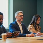 diverse business professionals in a meeting discussing ideas and strategies.
