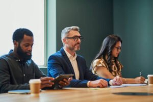 diverse business professionals in a meeting discussing ideas and strategies.